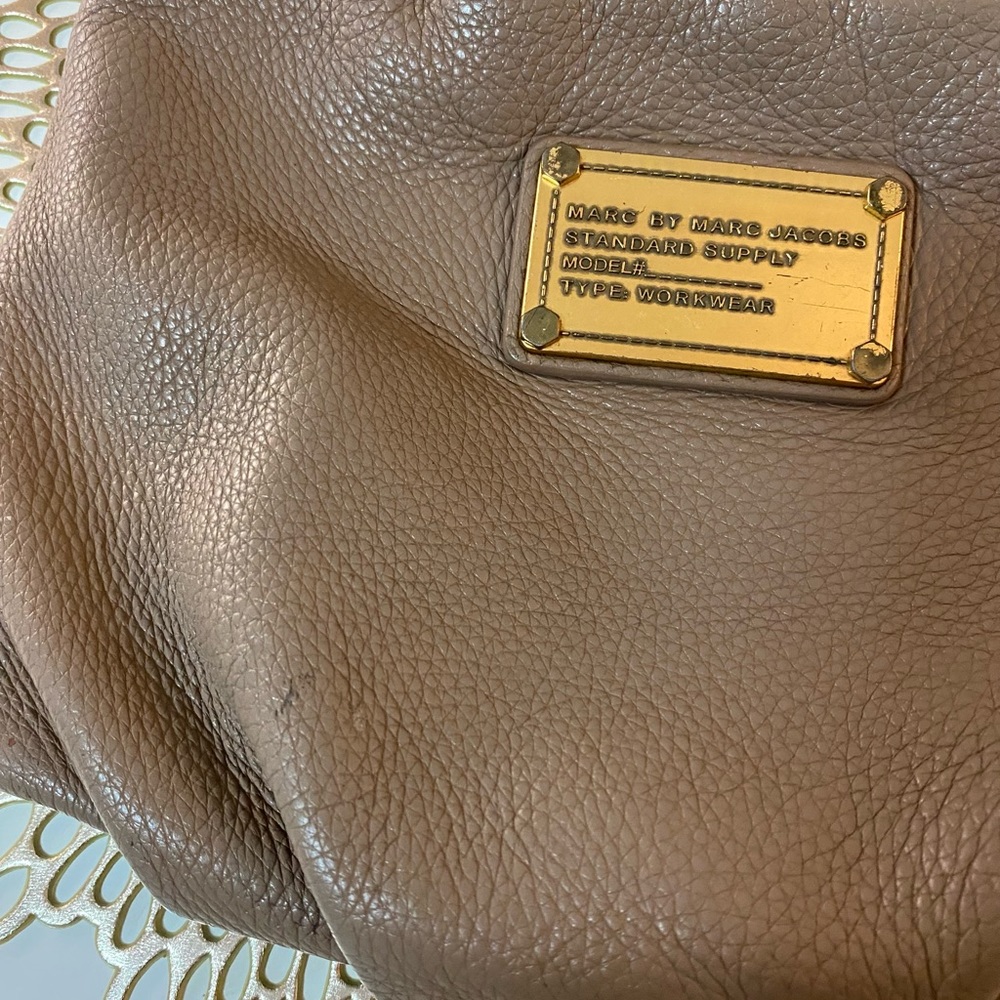 Marc Jacobs crossbody purse. Some minor wear and tear